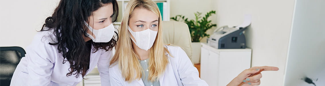 Primary Care Doctors Discussing a Case