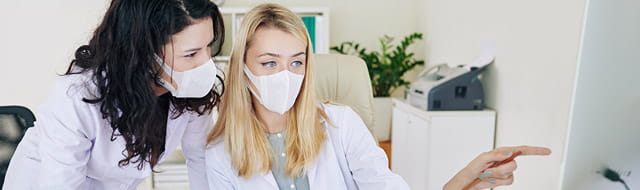 Primary Care Doctors Discussing a Case