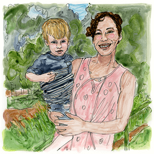 Dana Aravich holds her young son on her left hip.