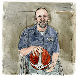 Lee Tempest sits in a wheelchair in front of a gray background holding a basketball on his lap.  