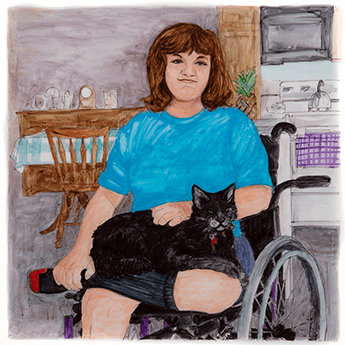 Shirley Nedzesky sits in a wheelchair in front of a table and stove with a black cat on her lap.