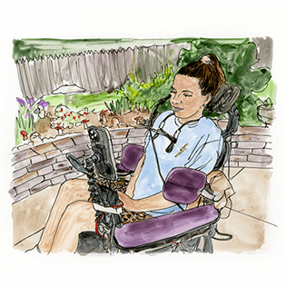 Victoria sits in a wheelchair in a garden looking at her phone.