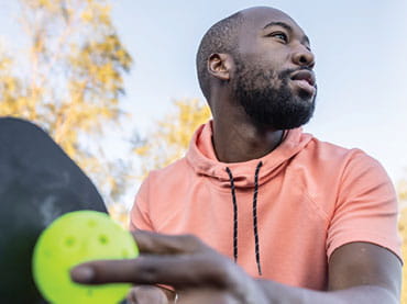 Man playing pickleball