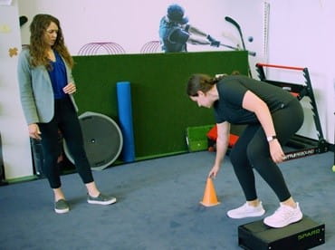 Image of a patient with a specialist at UPMC Sports Medicine.