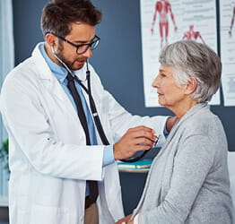 Doctor and heart patient