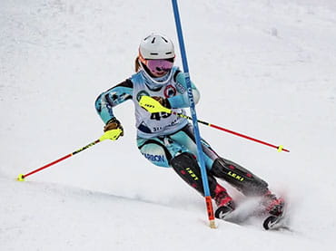 Photo of Lauren Waskowitz skiing.